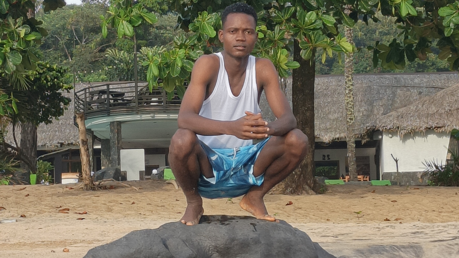 Nathan R. Watalah relaxing on beach in Grand Cape Mount County, Liberia 2026